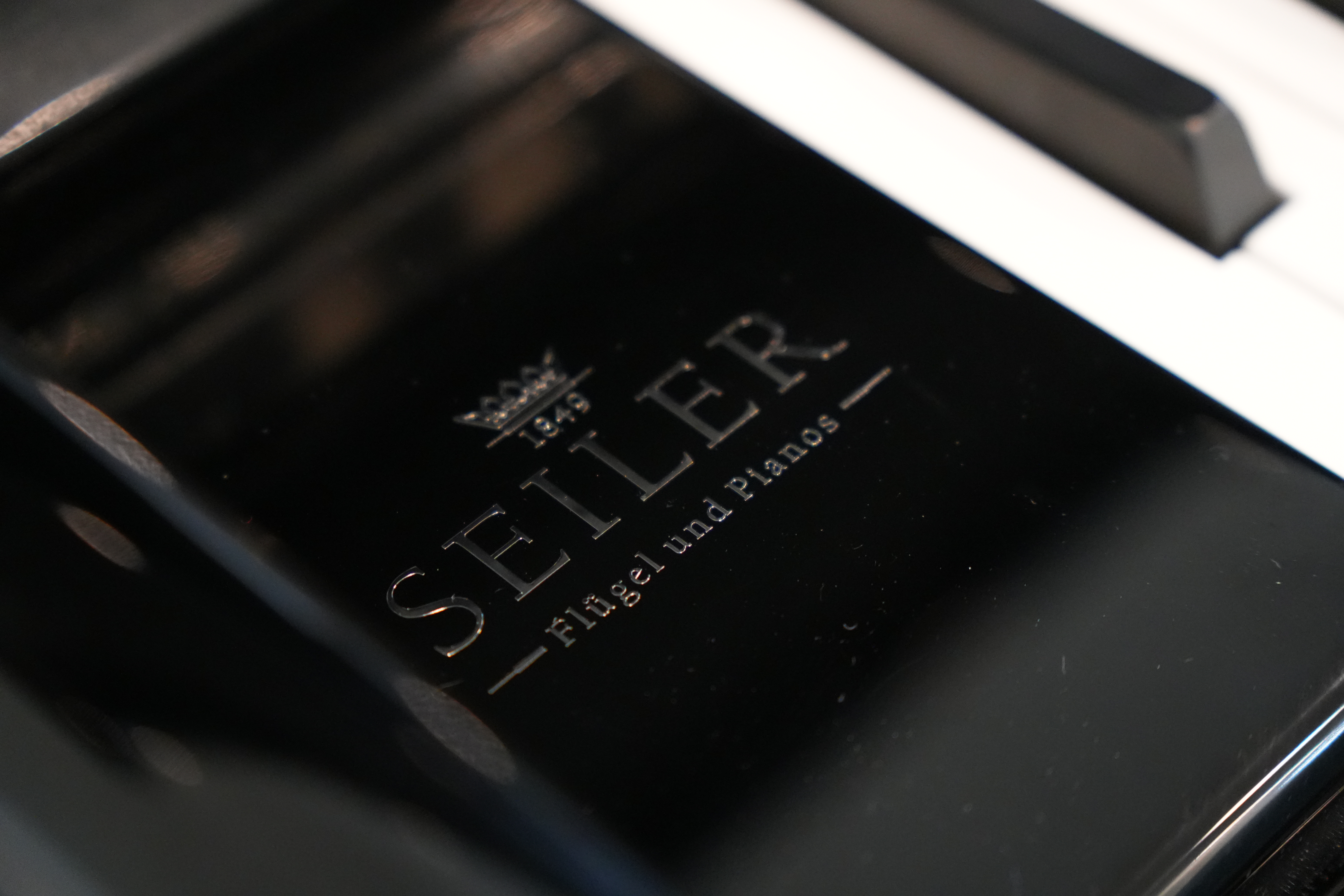 Johannes Seiler GS122 E/P Upright Piano in Black polyester – Gallery image – Roberts Pianos Houston