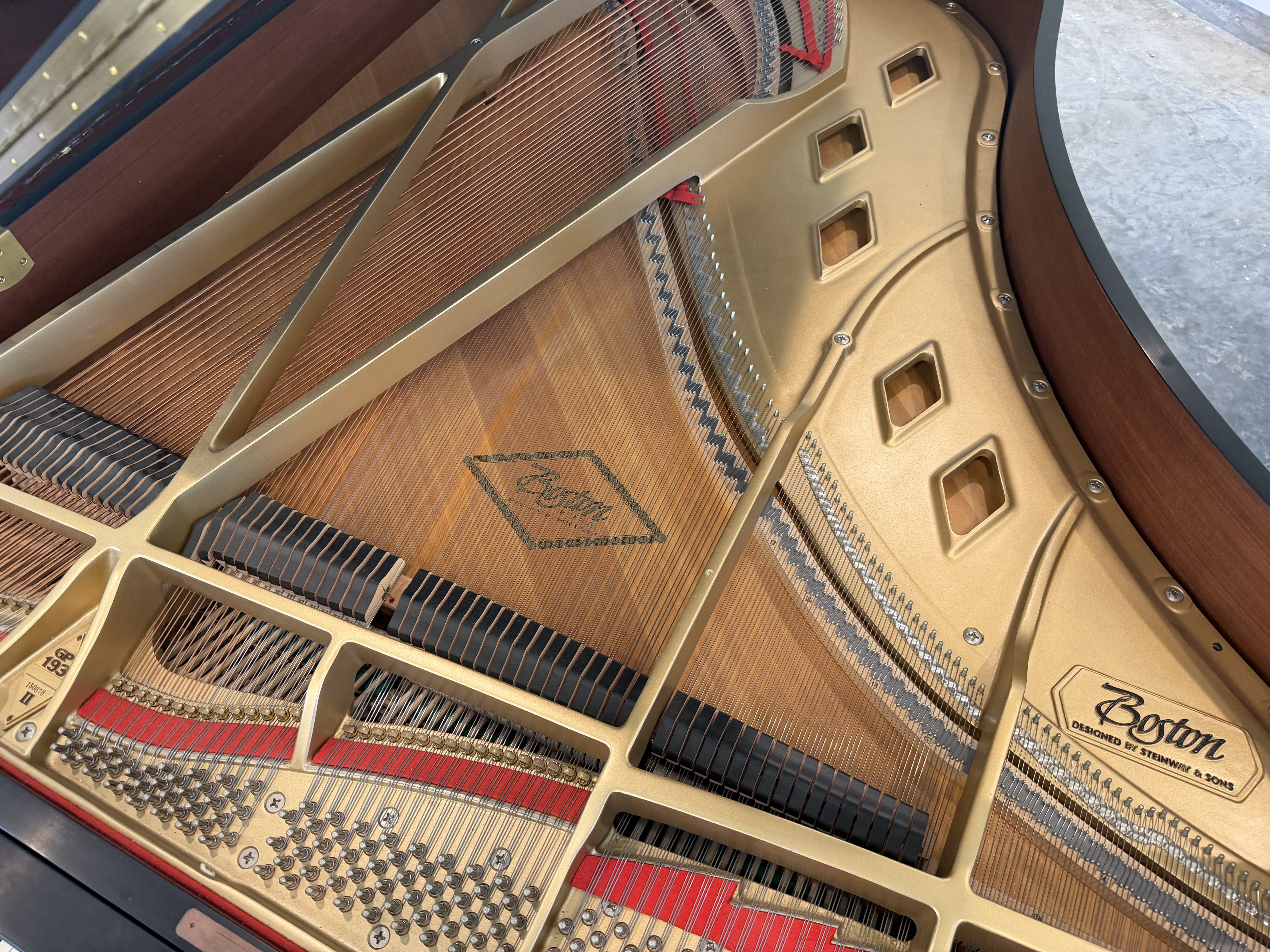 Frame with diamond pattern tapered soundboard