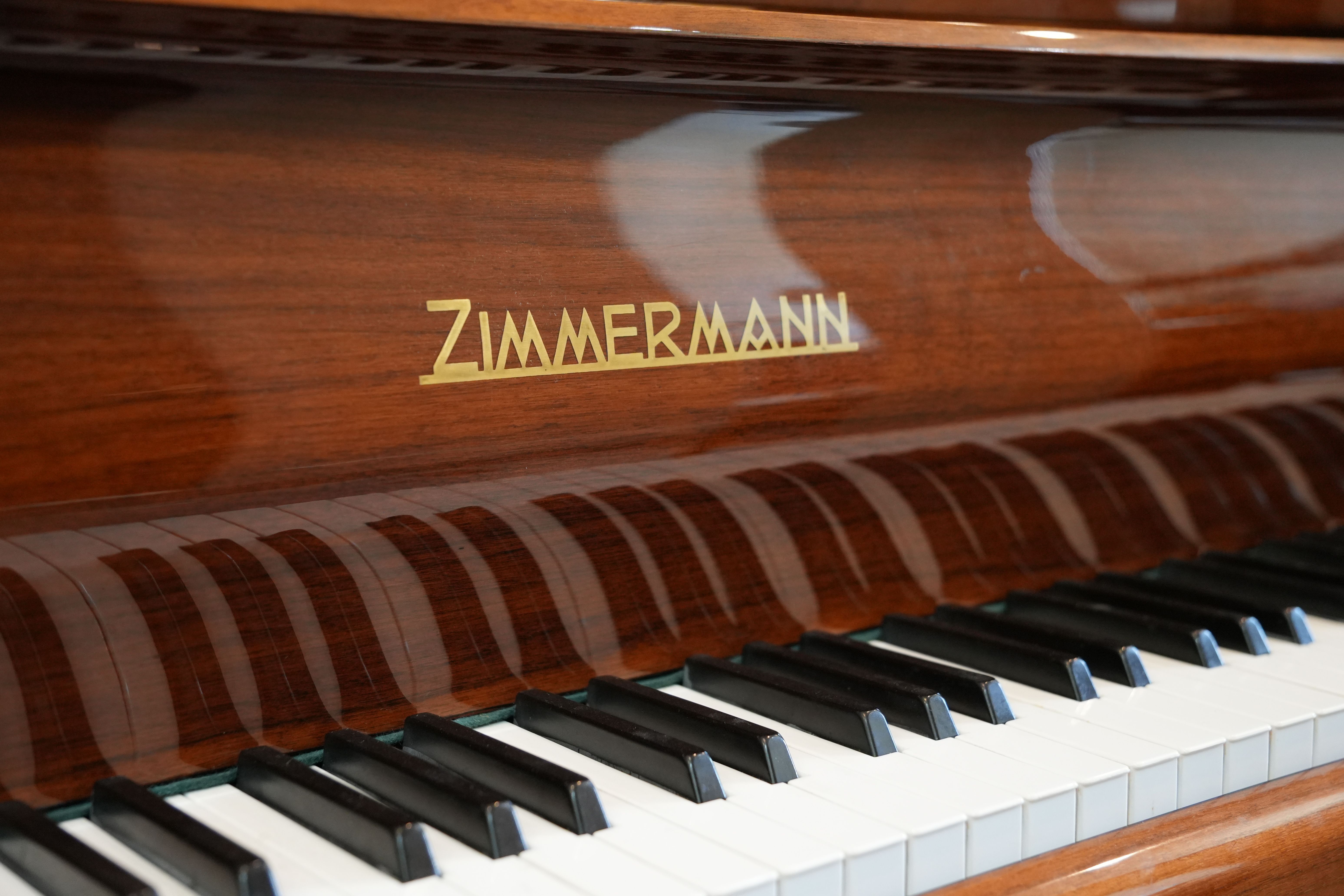 Zimmermann Grand Piano in cherry wood lacquer – Gallery image – Roberts Pianos Houston