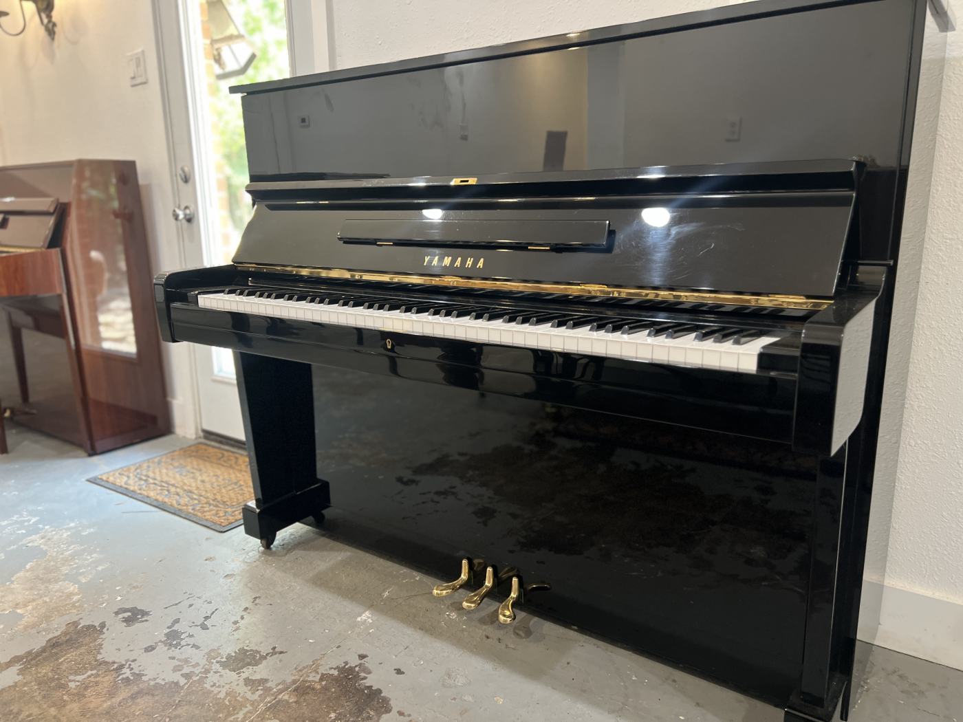 Yamaha U1 Upright Piano in Black Polyester – Featured image – Roberts Pianos Houston