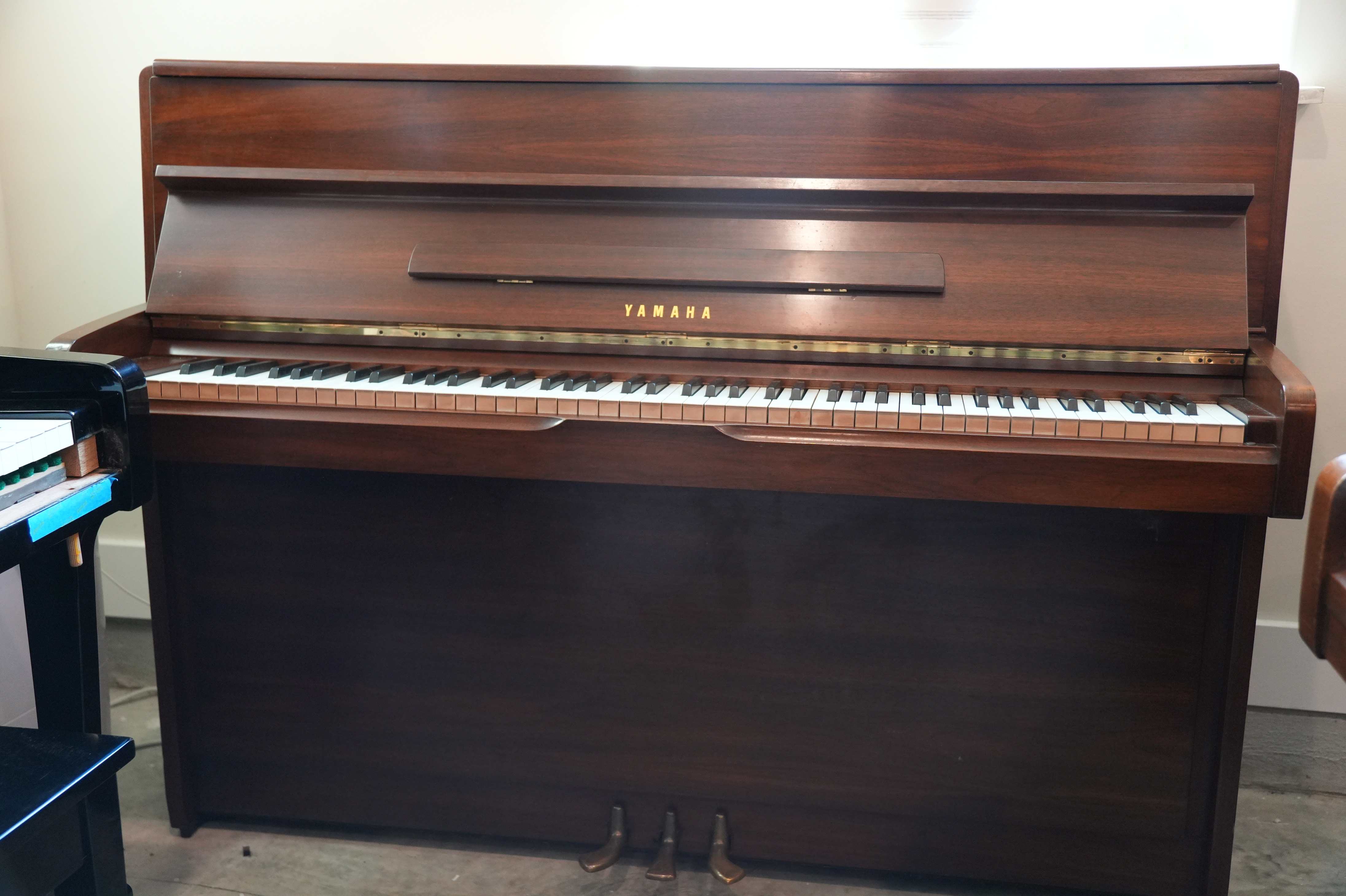Yamaha Upright Piano in Walnut – Featured instrument – Roberts Pianos Houston