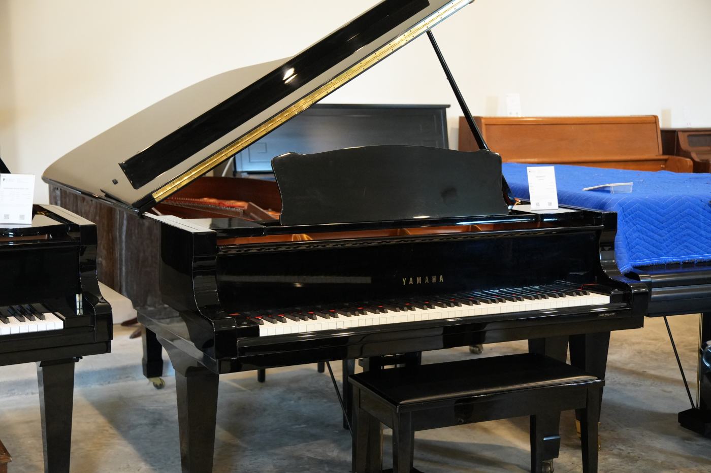 Yamaha C7 Grand Piano in Black Polyester – Featured image – Roberts Pianos Houston