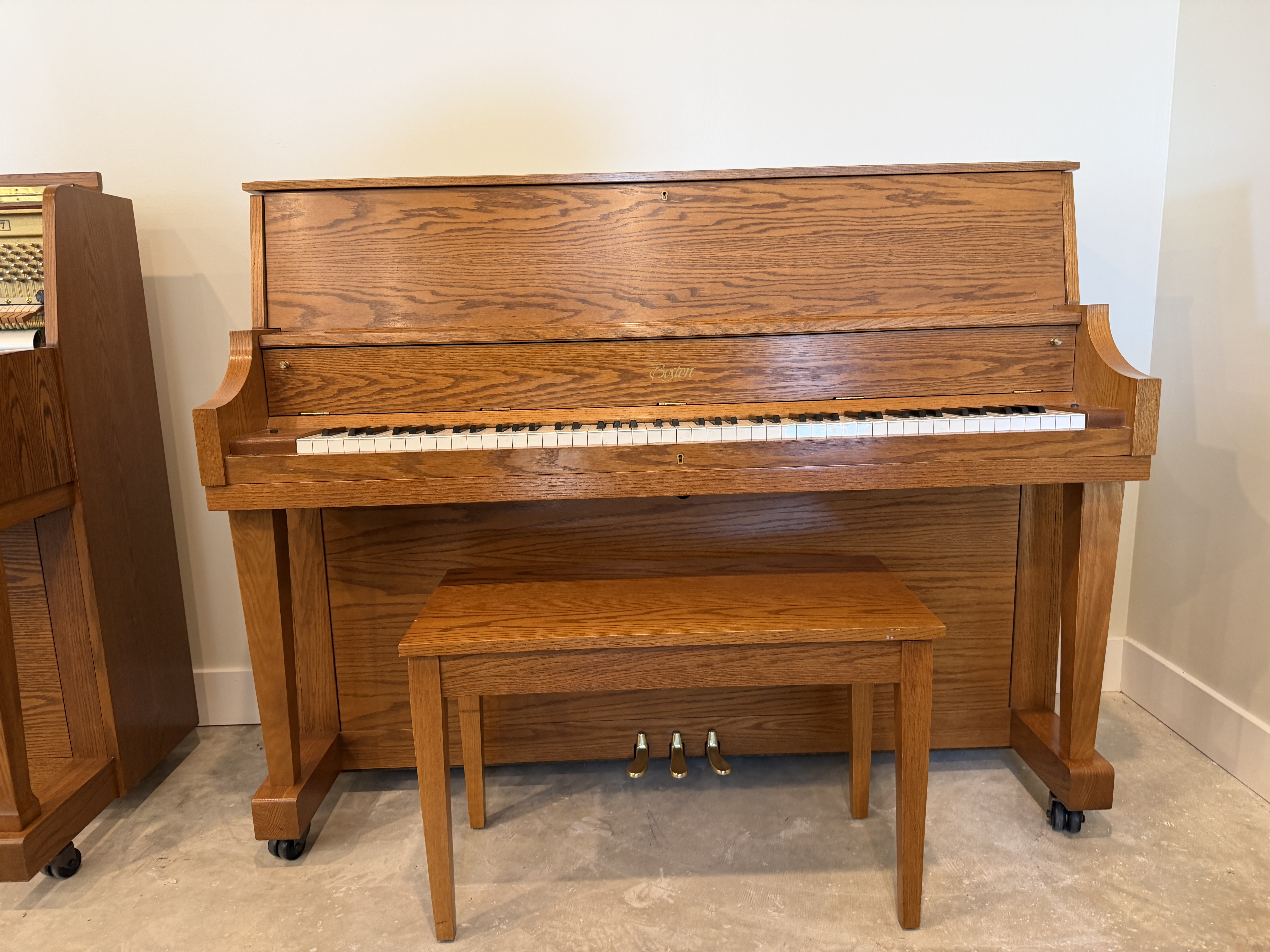 Boston UP-118 Upright Piano in Oak – Featured instrument – Roberts Pianos Houston