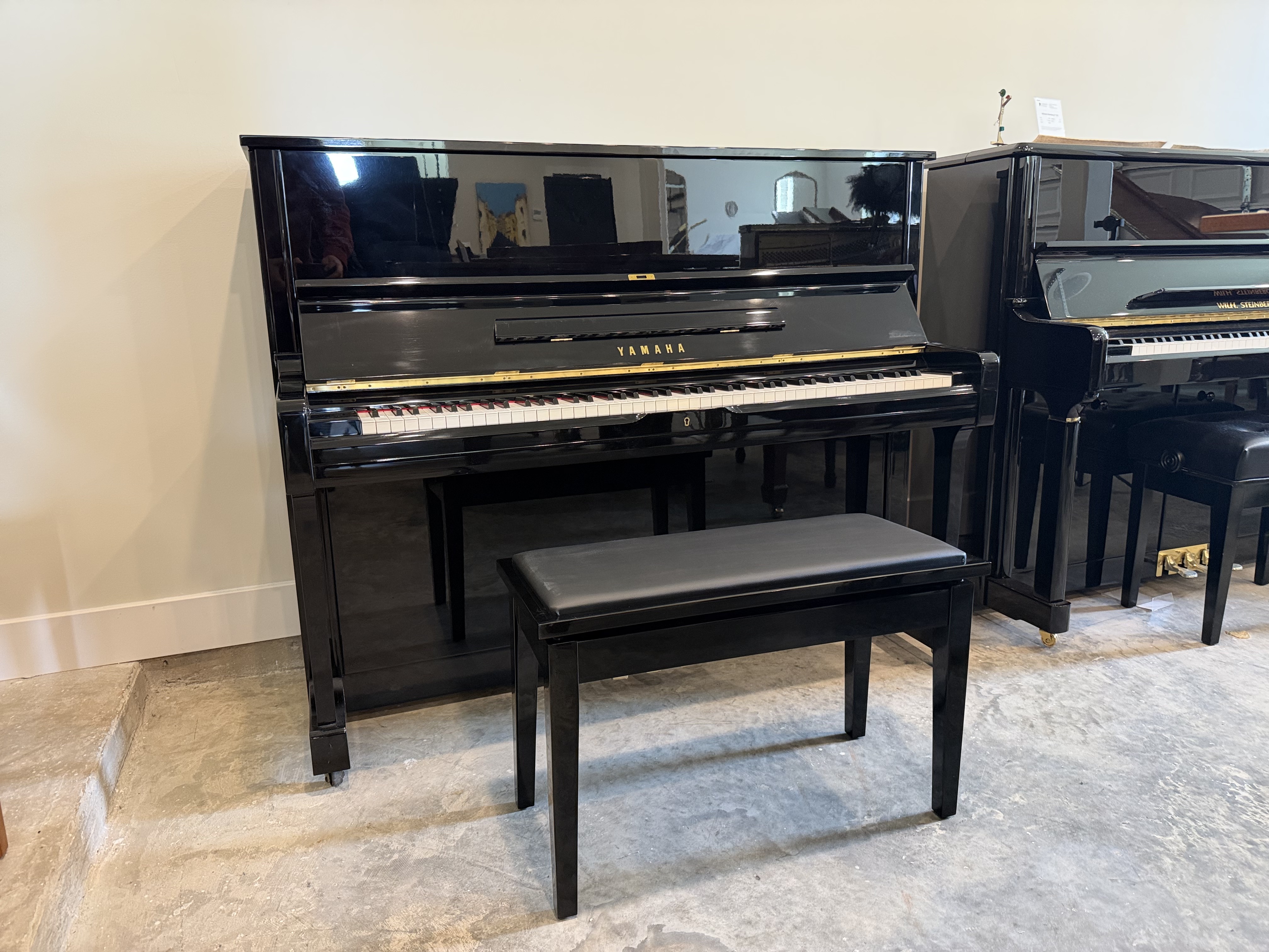 Yamaha U1 Upright Piano in Black Polyester – Featured image – Roberts Pianos Houston