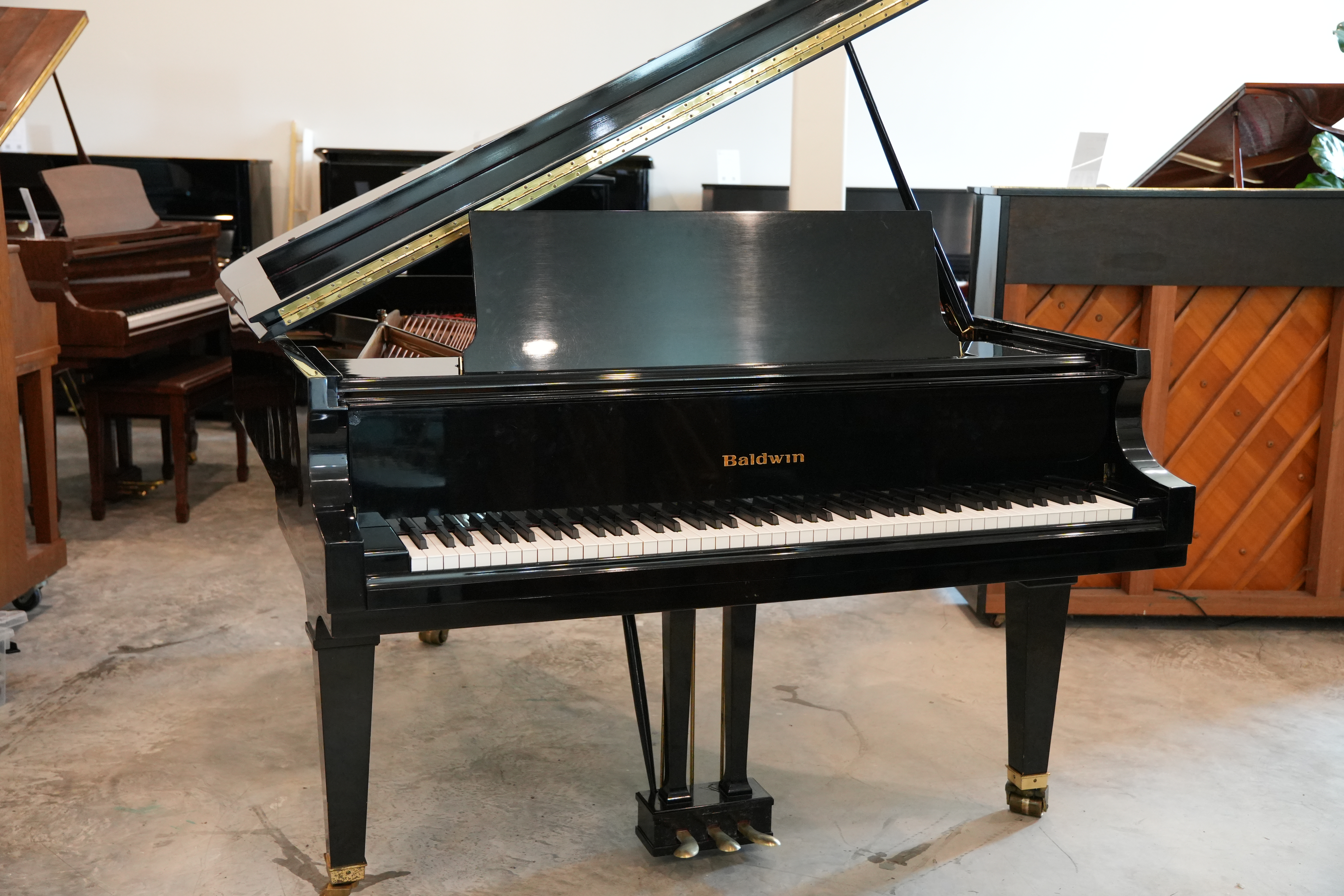 Baldwin Model L Grand Piano in Black Polyester – Inventory thumbnail – Roberts Pianos Houston